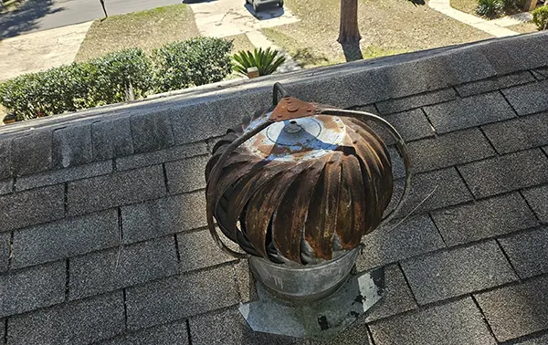 Roof inspection found a rusted wind turbine